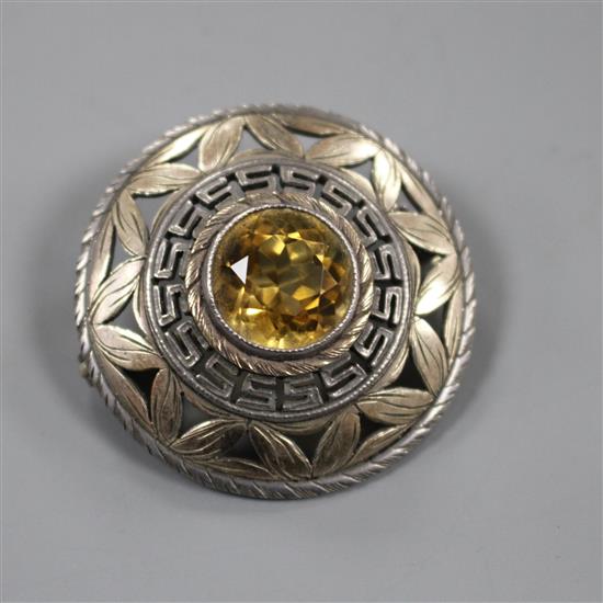 A 1960s Sybil Dunlop pierced parcel gilt silver and citrine set target brooch, London, 1965, 32mm, gross 9.1 grams.